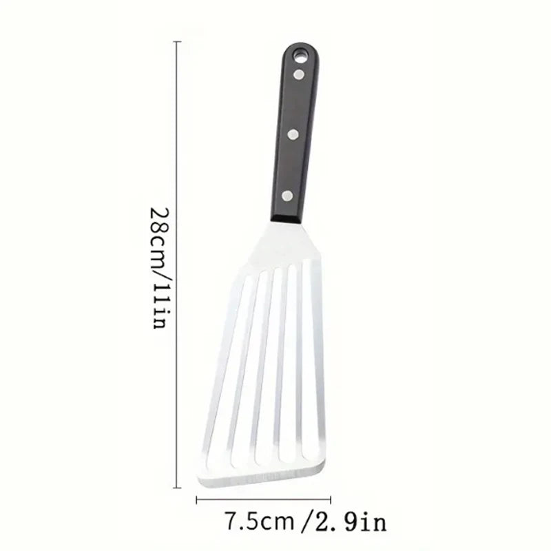 Mål på stekespaden: ca. 28 cm lang og 7,5 cm bred