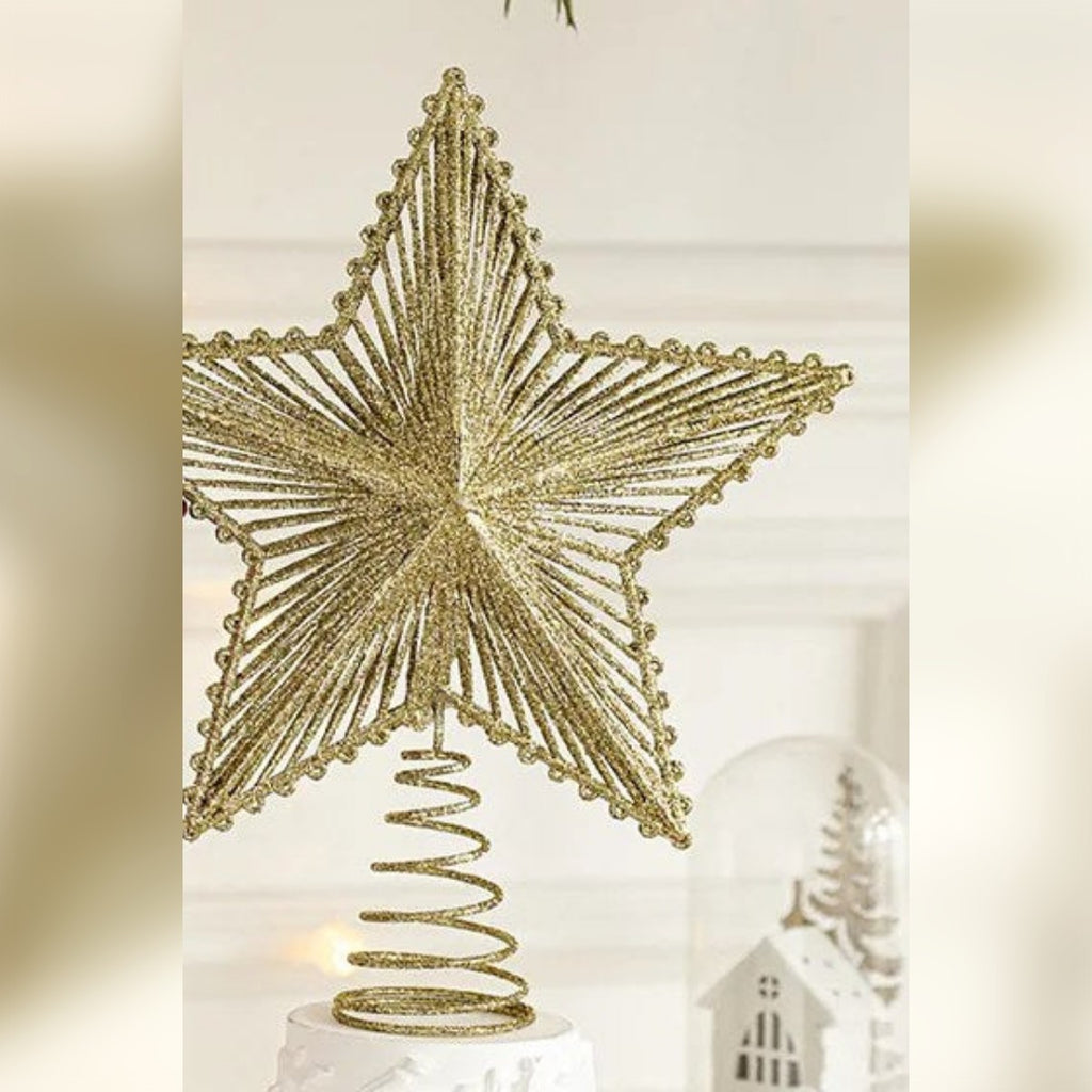 Juletrestjerne i gullglitter med spiral nederst