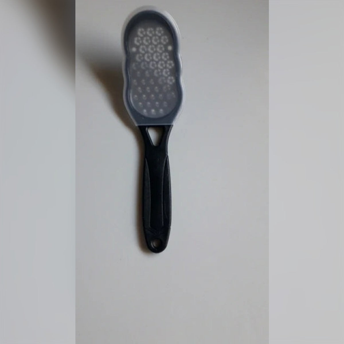Kundens bilde: fotfilen med det gjennomsiktige lokket satt på