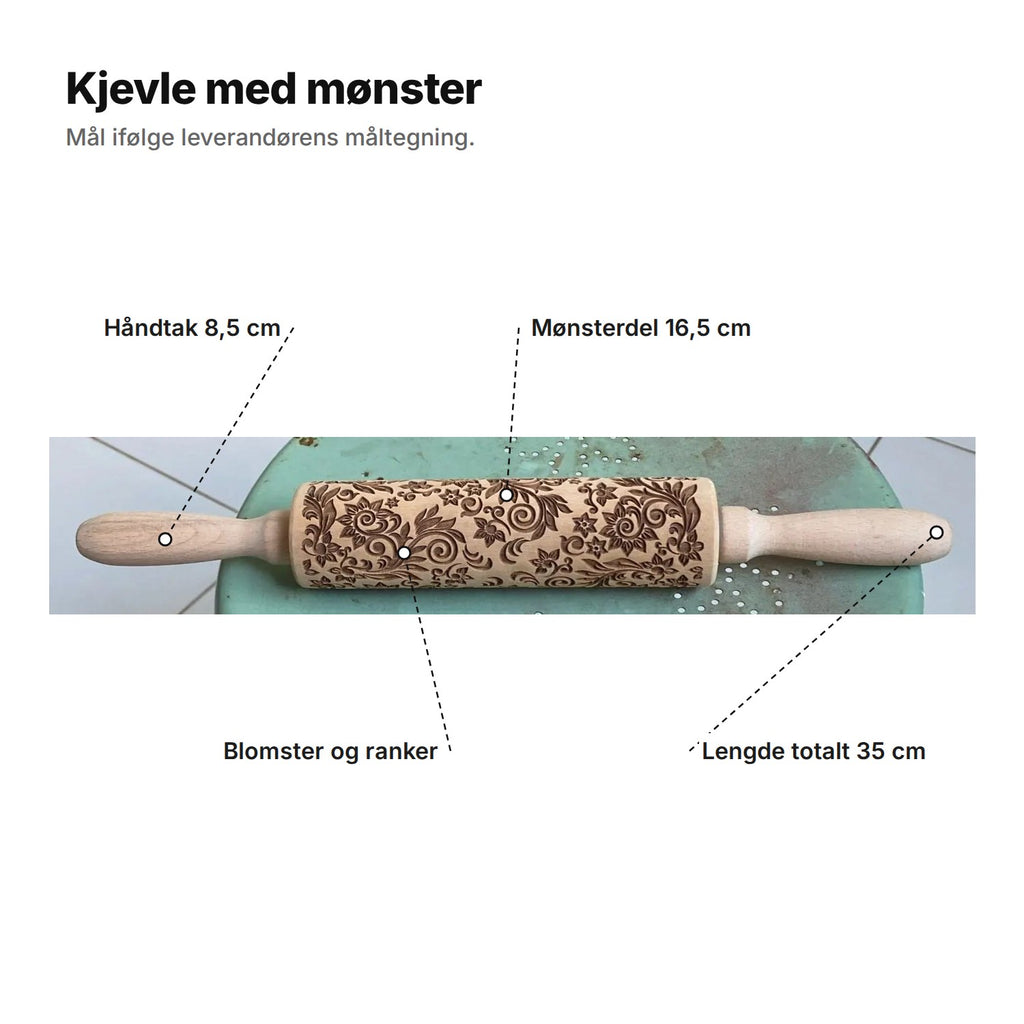 Kjevle med mønster forklart: håndtak 8,5 cm, mønsterdel 16,5 cm, blomster og ranker, lengde totalt 35 cm