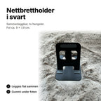 Svart sammenleggbar nettbrettholder med to hengsler og fot på ca. 9 × 7,9 cm